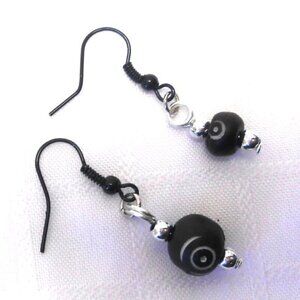 Beautiful handmade earrings with engraved elk bone no 1665